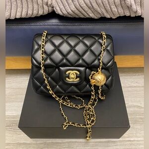 Chanel Black Mini Bag with Gold Accents